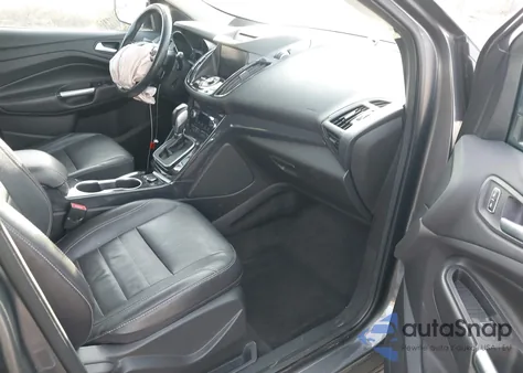 2014 Ford Escape Titanium z USA, uszkodzony, nr VIN 1FMCU9J94EUB71011